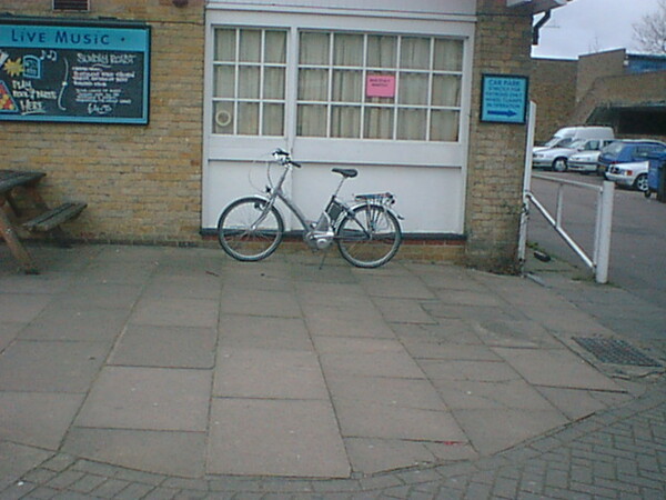 The photo for Blue Moon pub ('The Moonshine Still') lack of cycle parking 16/2055/FUL.
